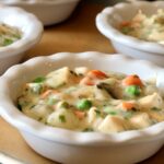 individual chicken pot pie dishes with pot pie filling