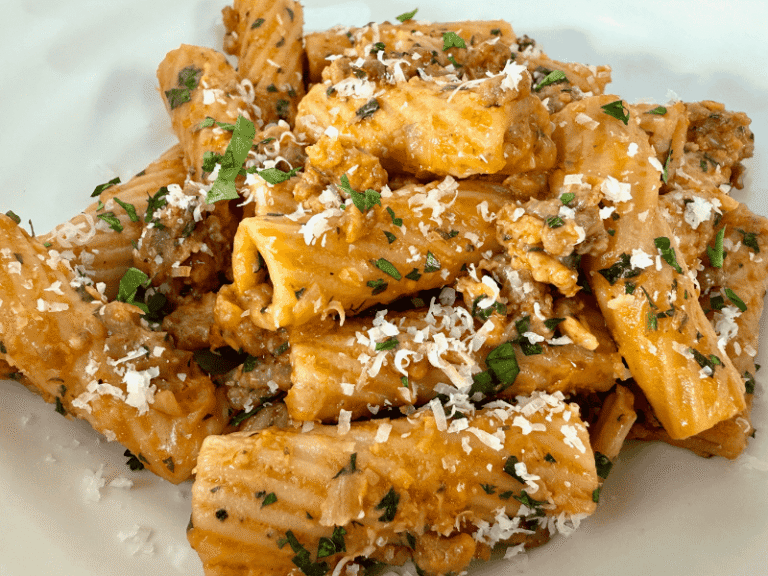 Ina Garten's Rigatoni with Sausage & Fennel in a white serving bowl