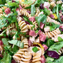 italian pasta salad with salami and arugula