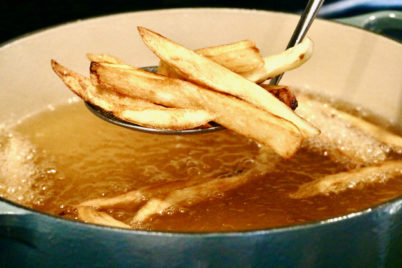 English Chips being fried in a pot