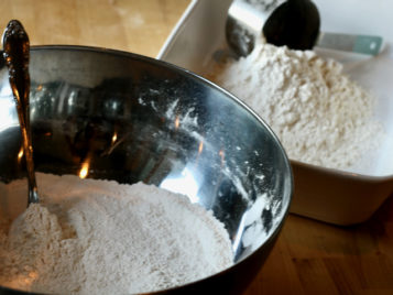 Preparing flour to make batter for fish & chips