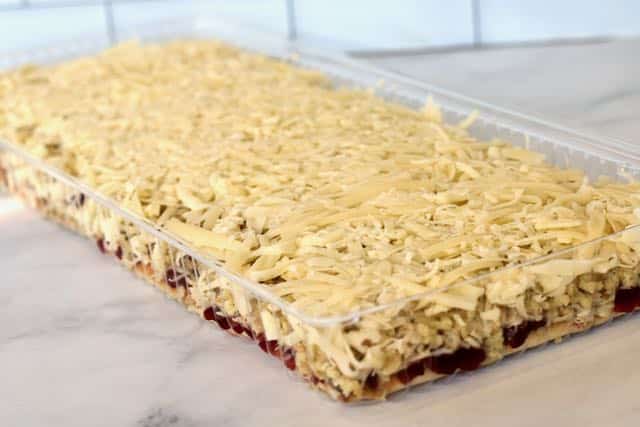 flatbread layered with cranberry sauce, shredded turkey, stuffing & cheese