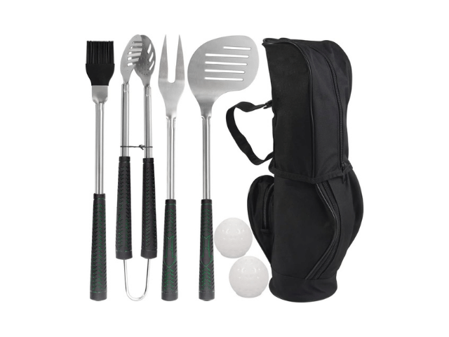 A BBQ grill tool set with a black carrying case. The set includes a basting brush, tongs, meat fork, and a spatula, all with long handles. Two white balls are also placed next to the carrying case.
