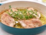Ina Garten's Lemon Chicken breasts in a teal cooking pan