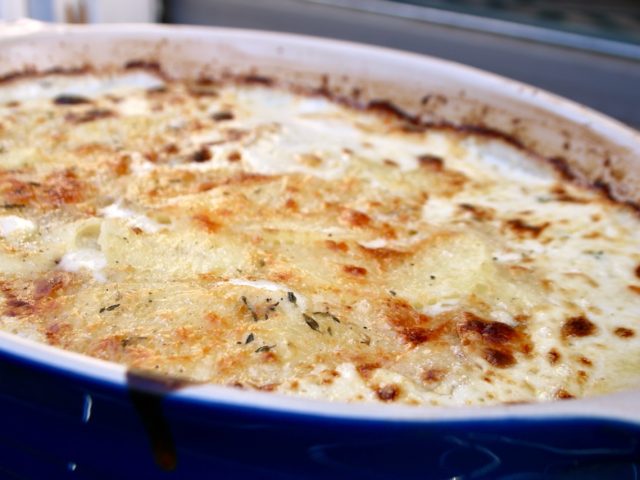 Scalloped potatoes au gratin baked until golden brown & bubbly
