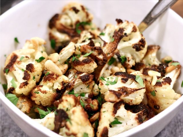 Roasted Cauliflower in a dish garnished with Parsley